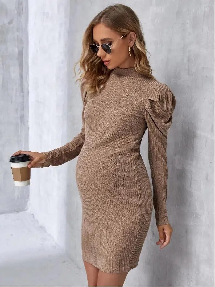 Expertly crafted for comfort and style, our Knitted High Collar Maternity Dress with Long Sleeve is designed for the expectant mother. Made with soft, knitted fabric and a high collar for extra coverage, this dress offers both functionality and elegance. Perfect for any occasion, it's a must-have in every maternity wardrobe.