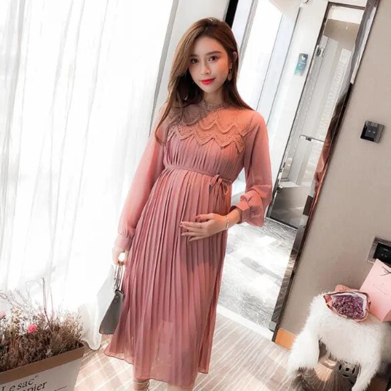 As a product expert in the maternity wear industry, I highly recommend our Sweet Chiffon Maternity Dresses. These long sleeve pleated dresses are made with soft and lightweight chiffon, providing both comfort and style for expectant mothers. With a flattering pleated design, this dress is perfect for any occasion.