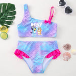 Load image into Gallery viewer, Mermaid-themed children's swimsuit with cartoon characters on a white background
