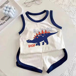 Load image into Gallery viewer, Children&#39;s sleeveless top and shorts set with dinosaur design on a white surface.
