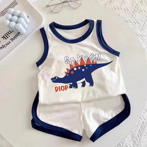 Children's sleeveless top and shorts set with dinosaur design on a white surface.