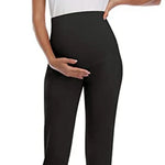 Load image into Gallery viewer, Black leggings worn by a person on a white background

