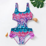 Load image into Gallery viewer, Colorful mermaid scale swimsuit with seashells on a white background
