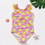 Load image into Gallery viewer, Pink swimsuit with lemon pattern on a white background
