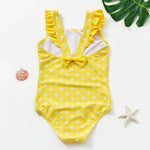 Load image into Gallery viewer, Yellow polka dot swimsuit with ruffles on a white background
