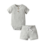 Load image into Gallery viewer, Cotton Ribbed Bodysuit and Pants Set for Babies: Comfortable and Stylish 
