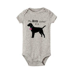 Load image into Gallery viewer, &quot;Newborn baby wearing a one-piece bodysuit, showing
